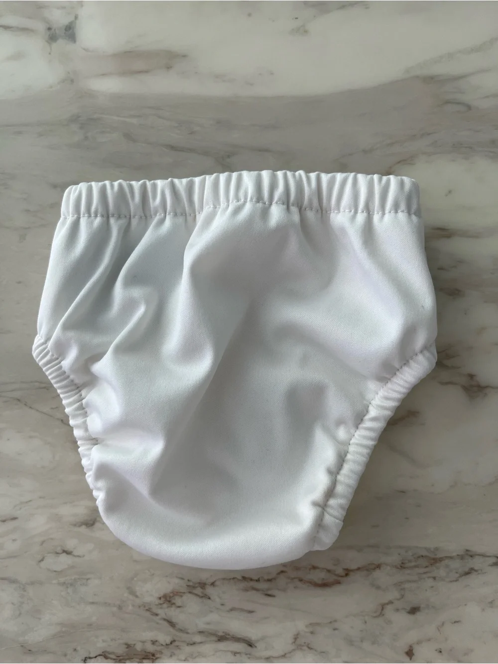 Charlie Banana White Swim Diaper Cover with Blue Logo Patch